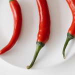 Красный острый перец чили как символ природной интенсивности и остроты